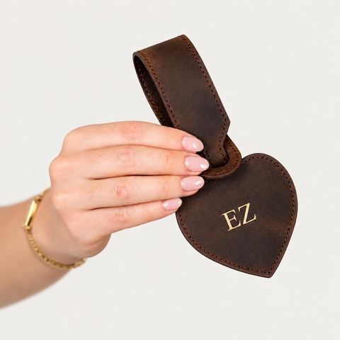 Heart Luggage Tag detail — Grecorium leather accessory on a neutral background