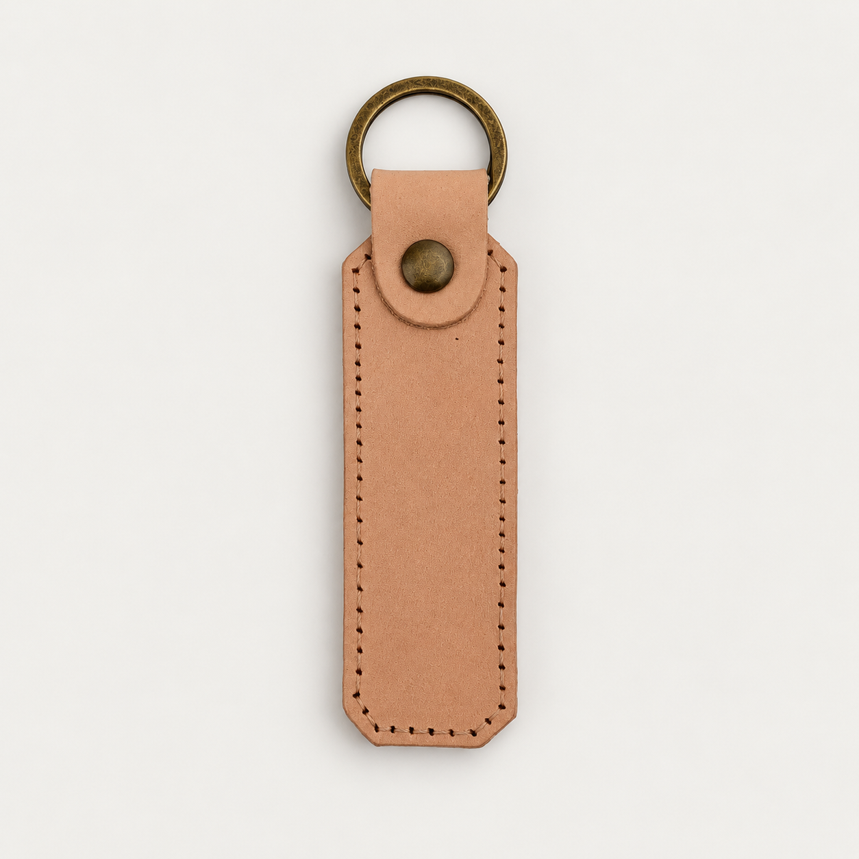 Column Shape Keychain No. 3 — Grecorium leather accessory on a neutral background