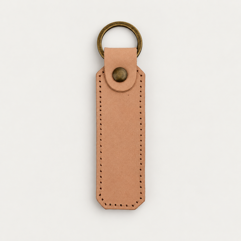 Column Shape Keychain No. 3 — Grecorium leather accessory on a neutral background