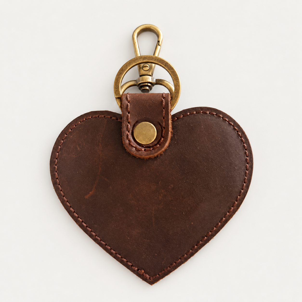 Heart Shape Keychain — Grecorium leather accessory on a neutral background
