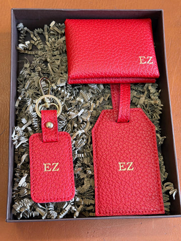 Red vegan leather gift set with gold foil initials in its gift box